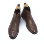 Top-down image of Brown Vittorio Chelsea Boots revealing soft lycra lining and detailed stitching on wingtip toe
