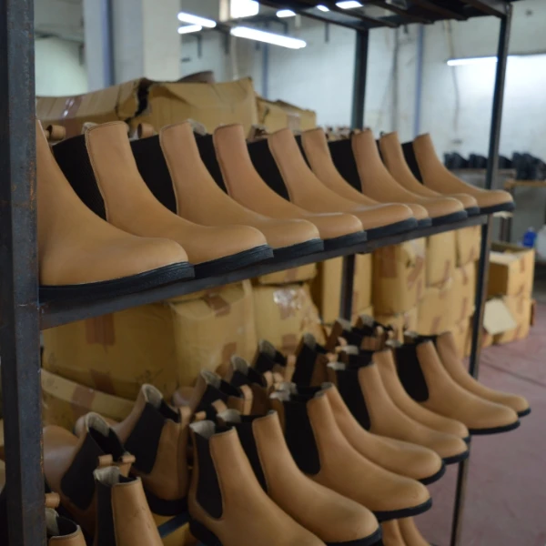 chelsea boots at stand for finishing