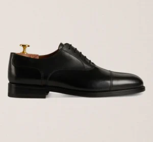 Devogue Paris black cap-toe Oxford shoes in full-grain leather