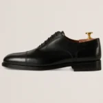 Devogue Paris black cap-toe Oxford shoes in full-grain leather