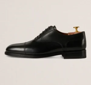 Devogue Paris black cap-toe Oxford shoes in full-grain leather