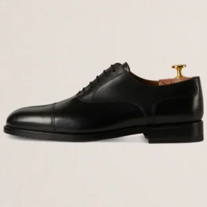 Devogue Paris black cap-toe Oxford shoes in full-grain leather
